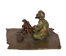 Arab Man with Three Monkeys