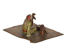 Arab Man with Three Monkeys