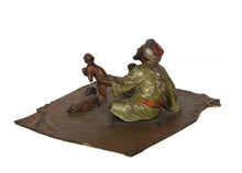 Arab Man with Three Monkeys