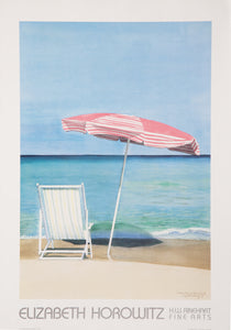 A Beach Chair and Pink Umbrella