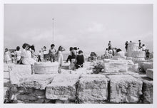 Tourists and Marble Fragments
